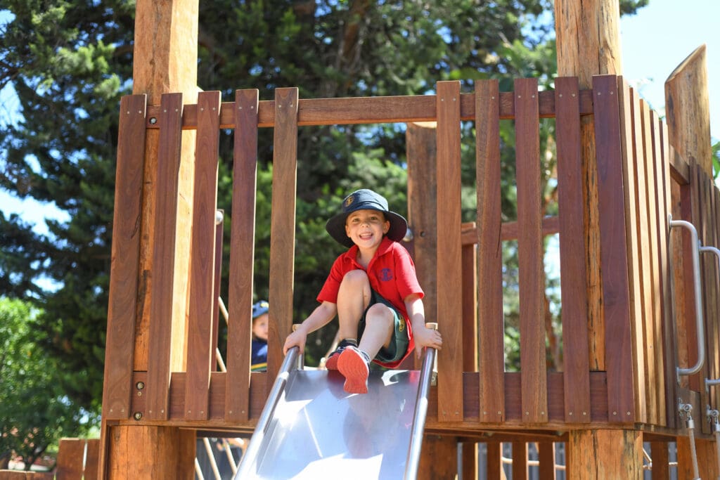 junior school student on a slide