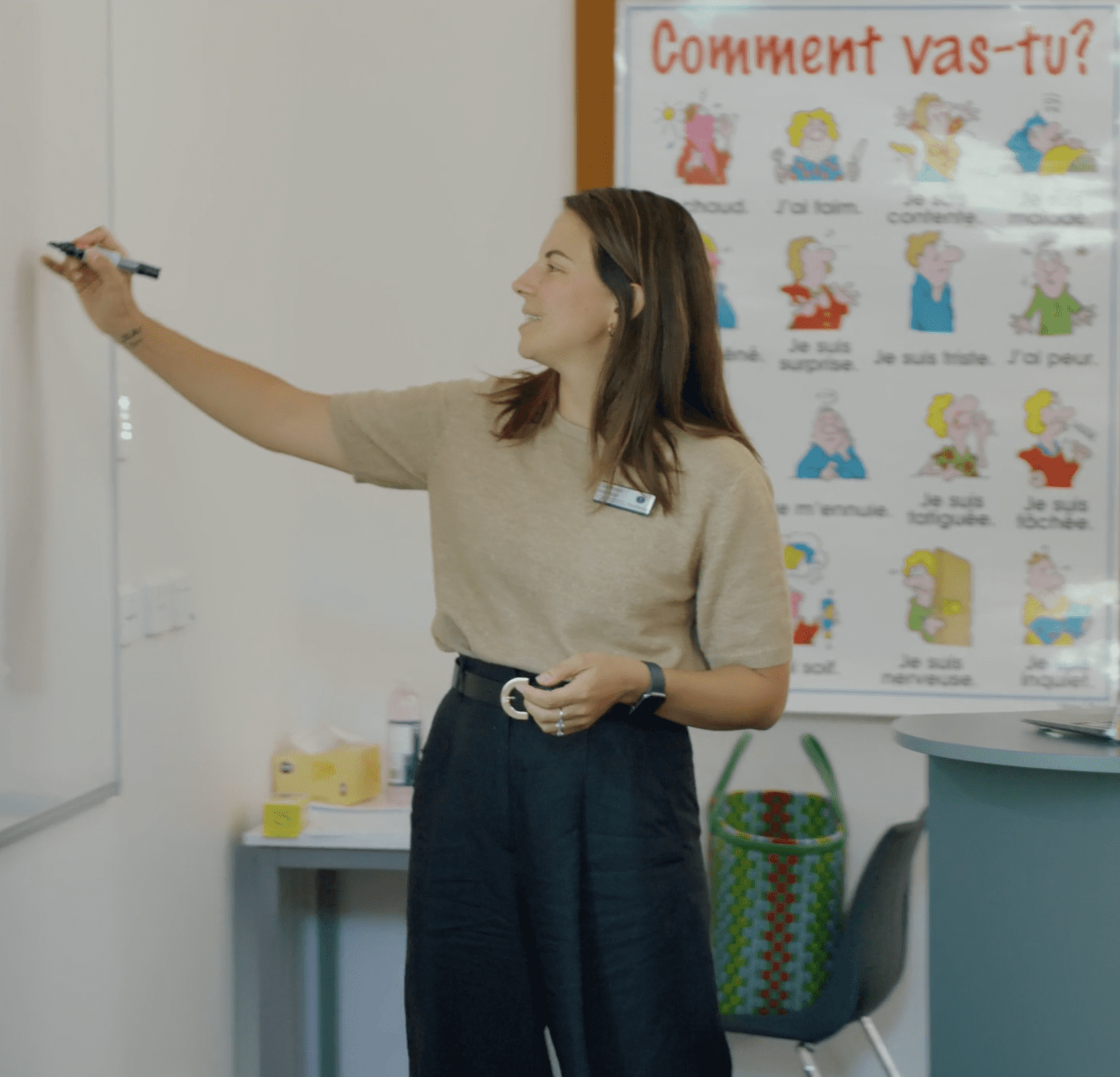 French Language Coordinator & Semi-Immersion Leader 2024 drawing on whiteboard in classroom