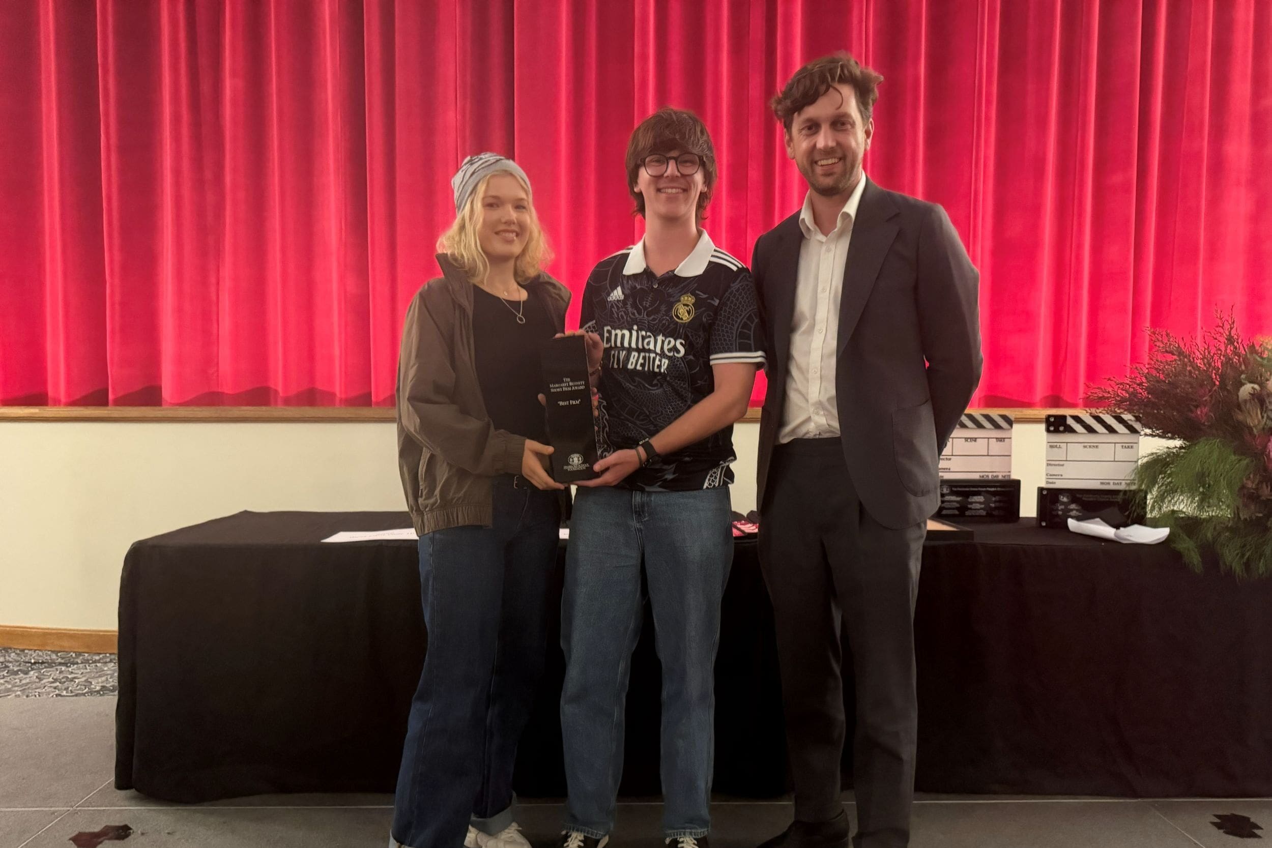 Producer, Anton Andreacchio (2004), with Brooke Mumford and Max Stapleton (both 2025), winners of the Margaret Bennett Award for Best Film, at the 2026 Unreel Film Festival.
