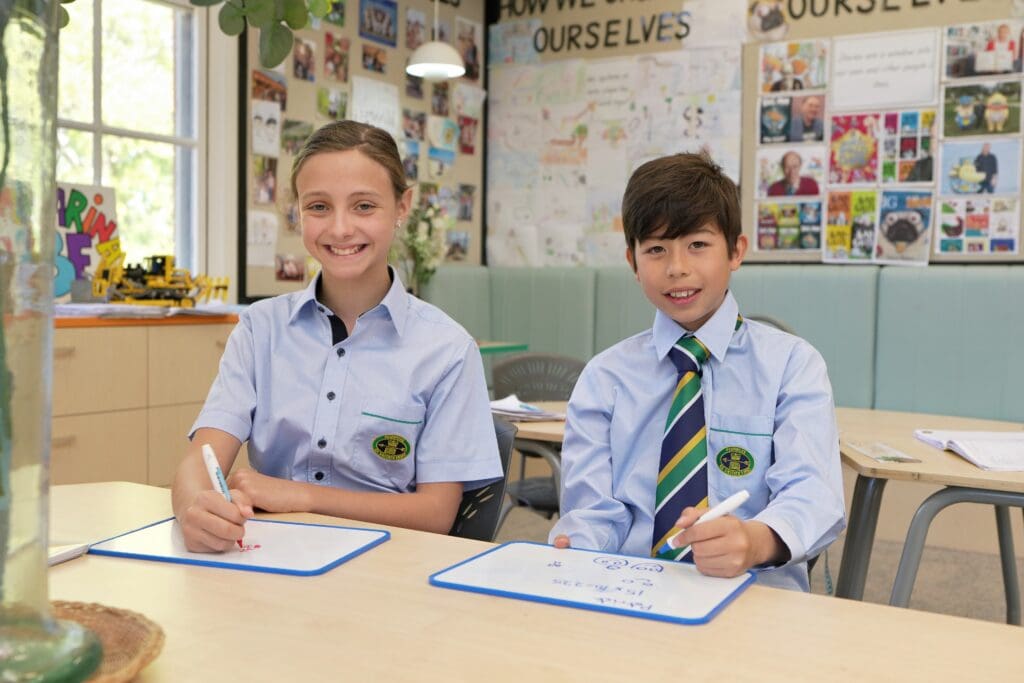 JS boy and girl drawing at desk Sep 25