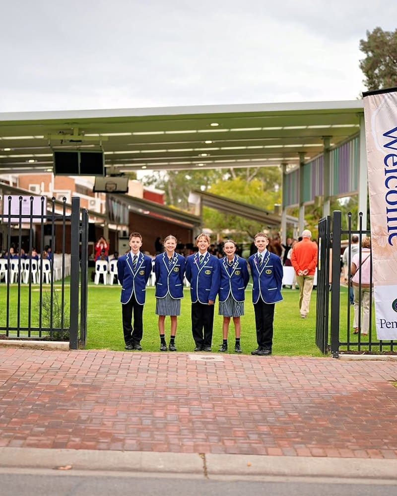 junior school students welcoming parents to the opening of the new playground